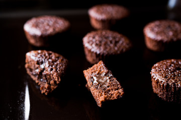 Mini Chocolate Cake Souffle on wooden surface.