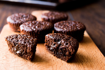 Mini Chocolate Cake Souffle on wooden surface.