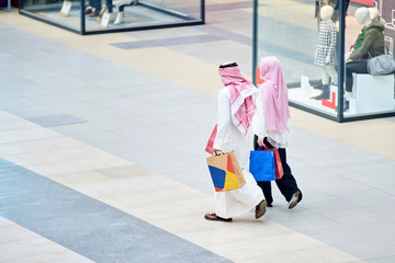 Young muslim couple shopping