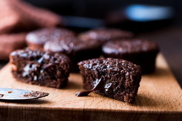 Mini Chocolate Cake Souffle on wooden surface.