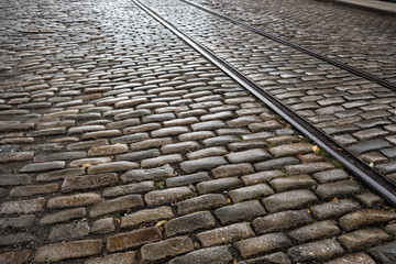 Cooble stone strret with old train tracks