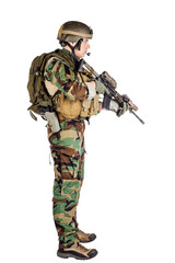 Portrait soldier or private military contractor holding sniper rifle.