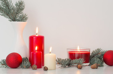 Christmas decoration with candles on white background
