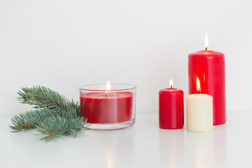 Christmas decoration with candles on white background