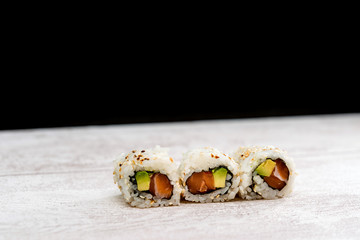 Japanese food Sushi Roll Maki of Salmon and avocado