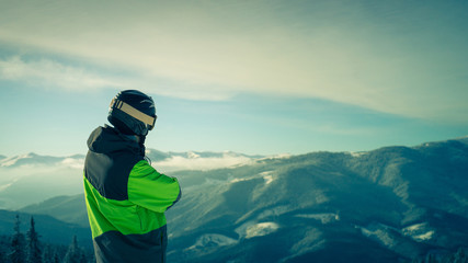Portrait of a skier in the mountains.