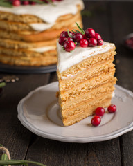 Honey nut ginger and carrot cake decorated with cranberries and rosemary. Perfect Christmas baked goods that you want to eat!)