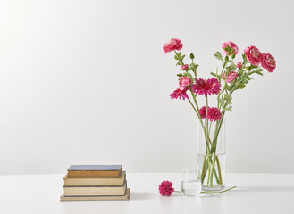 vase of flowers with objects white isolated background