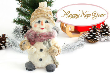 Happy New Year. Christmas snowman surrounded by pine cones. Snowman with Santa's sleigh. Pine cones. Christmas decorations. Christmas. New Year card. Card. 2017
