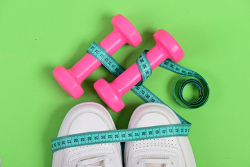Sport shoes and equipment for healthy shape. Centimeter on trainers