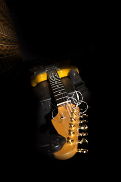 Electric Guitar Resting On Amplifire In Music Studio