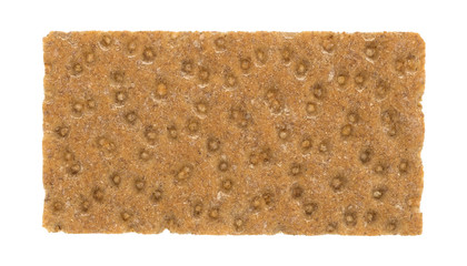 Top view of a single sourdough whole grain crispbread cracker isolated on a white background.