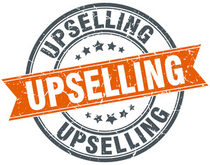 upselling round grunge ribbon stamp