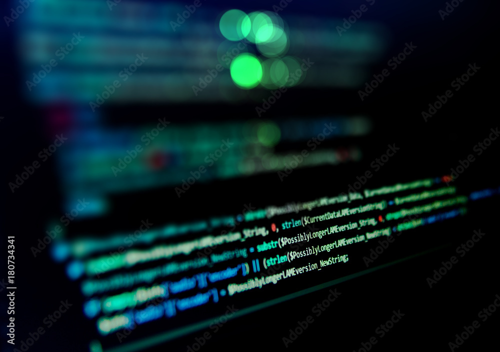 Wall mural screen with software developer code. blur lights.