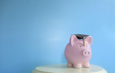 Piggy bank on blue