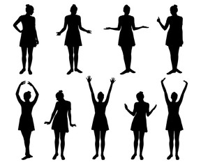 Set of realistic silhouettes of standing young women in different poses, isolated on white background
