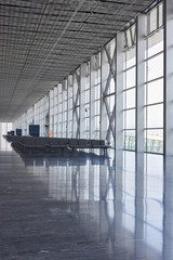 airport with different style seating area and empty area