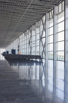 airport with different style seating area and empty area