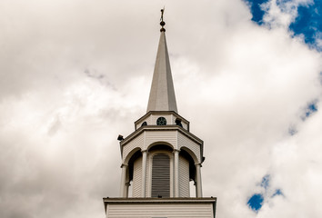 Isolated church steeple. Building tower steeple. Isolated architeure detail and design. Architectural detail. Abstract building exterior. Minimal design.