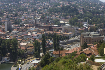 Fototapeta na wymiar View from the top of Yellow Fortress os Sarajevo downtown, with the city Hall