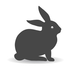 Obraz premium Silhouette of a gray hare (rabbit), sitting and looking askance, against white background,