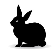 Silhouette of a black hare (rabbit), sitting and looking askance, against white background,