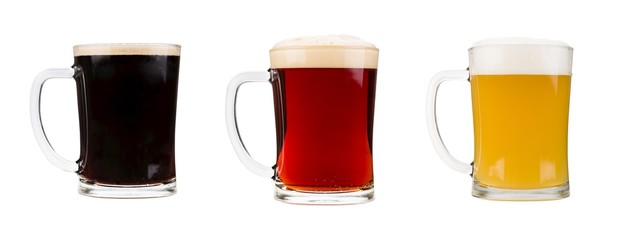 Three beer mugs isolated on white background