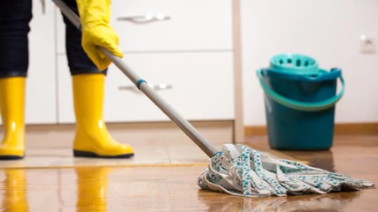 Foto op Plexiglas Housekeeper mopping tiled floor © Budimir Jevtic