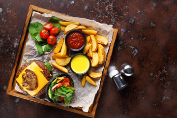 Take away burger menu on wooden tray top view