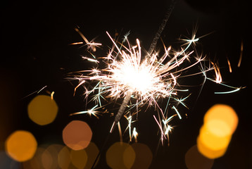 Bengal lights, sparkle background. Christmas time, New Year