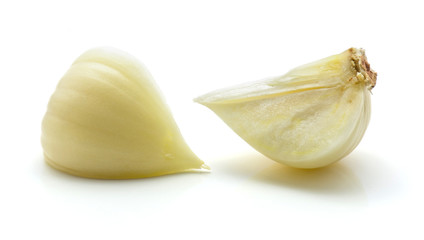 Two quarters of solo garlic isolated on white background single clove.