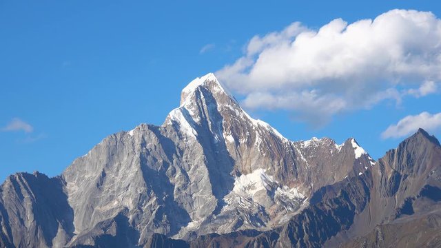 Four girl mountain ( Siguniang) and cloud flowing in Sichuan , China