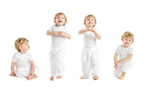 Happy little Baby Boy dressed in all white clothes, Sitting and Standing isolated on White Background