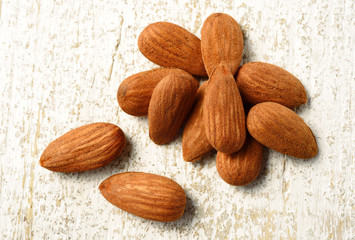 natural almonds on white table