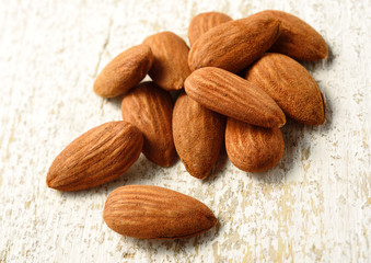 natural almonds on white table