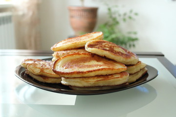 delicious pancakes on the plate cooked at home.