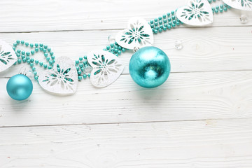 holiday decorations on white wood background and copy space, top view
