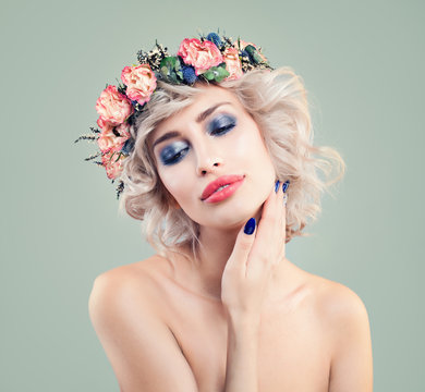 Beautiful Woman in Spring Flowers Wreath on Blonde Curly Bob Haircut