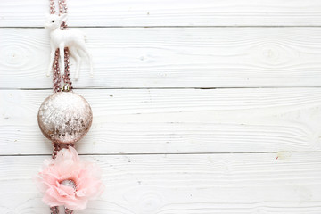 holiday decorations on white wood background and copy space, top view