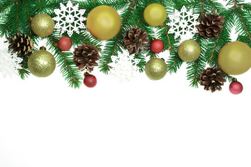 Christmas frame background from xmas tree and golden balls isolated on the white table and copy space for holiday text.