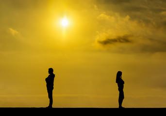 Silhouette of a sad girl and man on each other ,Couple break up