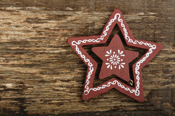 Decorazione Natalizia : stella di natale su sfondo legno