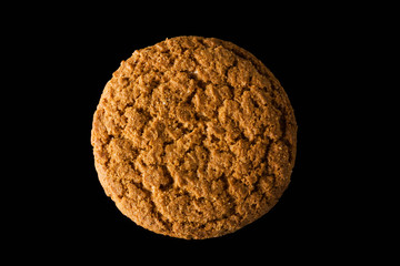 view from above, on oatmeal cookies, isolated on a black background