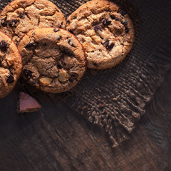 Chocolate chip cookies,  freshly baked on wooden table. Copy space.