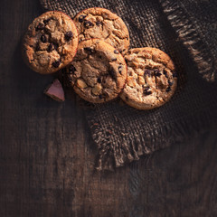 Chocolate chip cookies,  freshly baked on wooden table. Copy space.