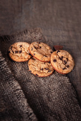 Chocolate chip cookies,  freshly baked on wooden table. Copy space.