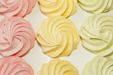 Fototapeta premium Meringues on a white background