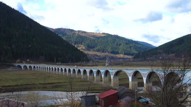 view of viaduct Poiana Largului at the lake Bicaz, Romania