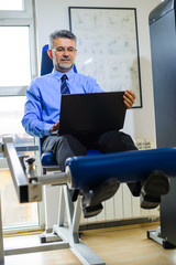 Business man training in gym