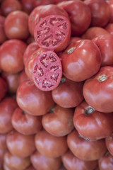 pile of ripe red tomatoes
